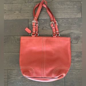 Beautiful Authentic Coral Coach purse. Clean and flawless inside. Strong straps.